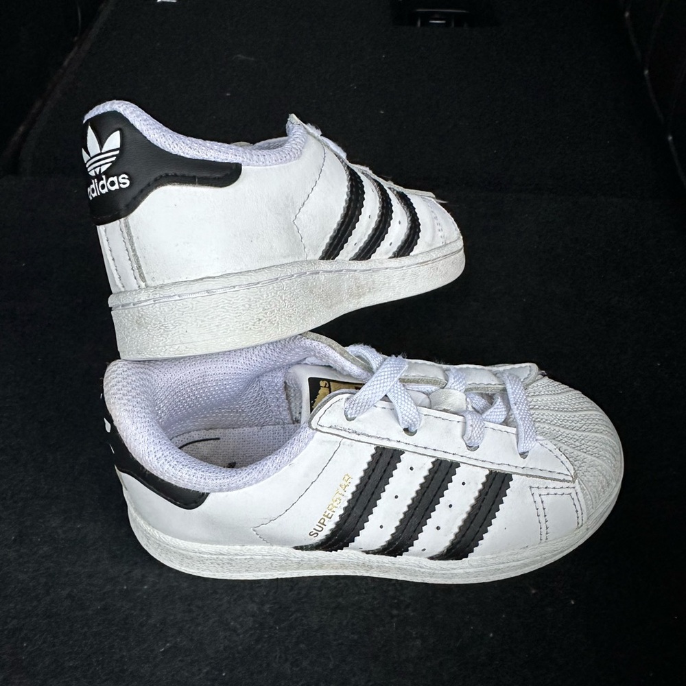 White and black shell toe